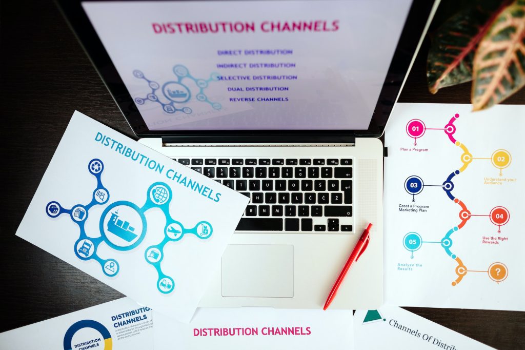 marketing distribution channels plan on office desk - customers are the 2nd pillar of the twin pillars of marketing.